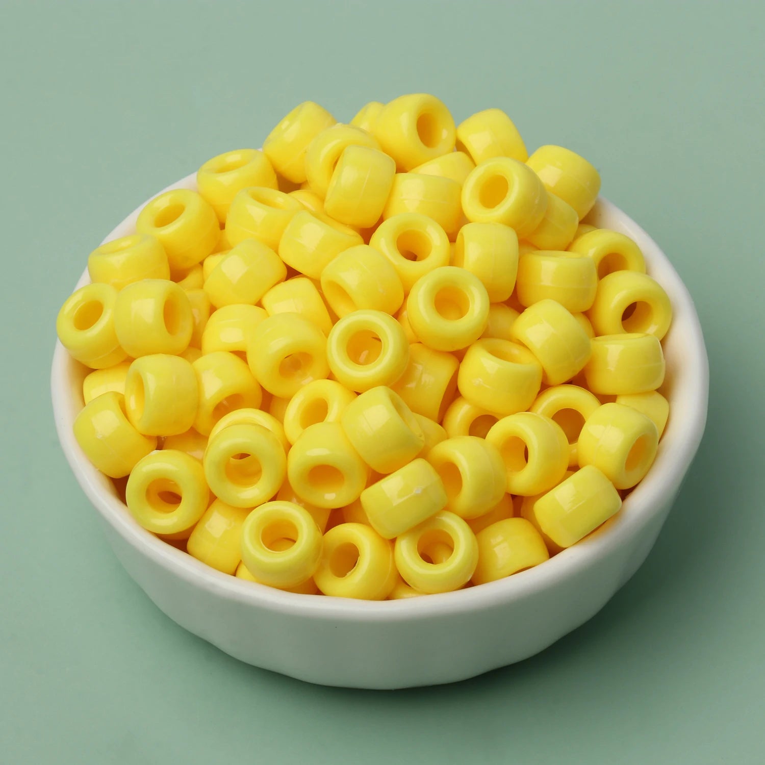 100 חרוזי פוני 6x9 מ"מ – חרוזים צבעוניים עם חור גדול ל־DIY ותכשיטים