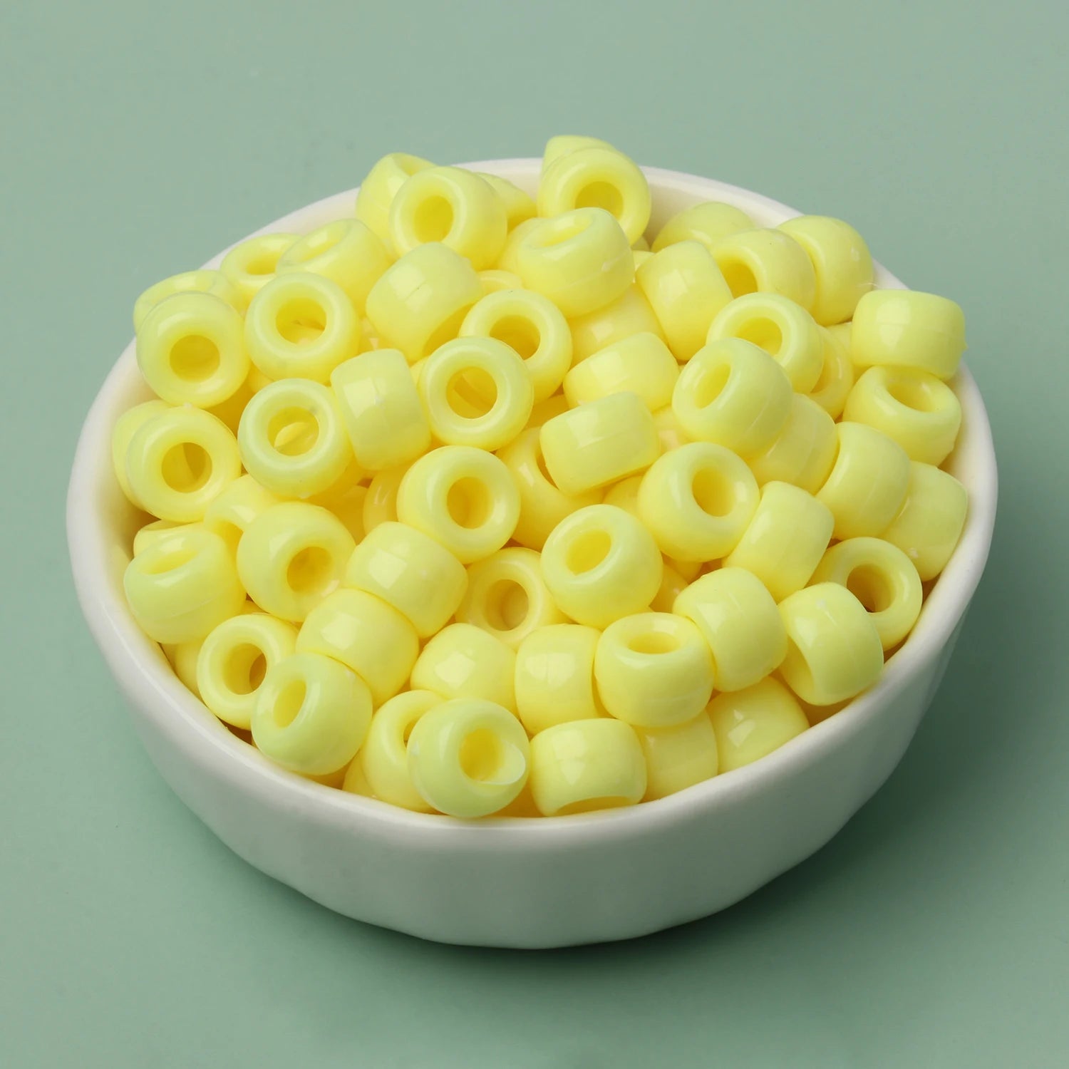 100 חרוזי פוני 6x9 מ"מ – חרוזים צבעוניים עם חור גדול ל־DIY ותכשיטים